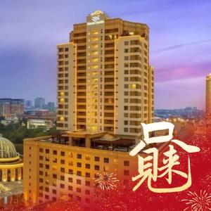 a building with a sign in front of it at Resort Suite Homestay By SunNest in Petaling Jaya