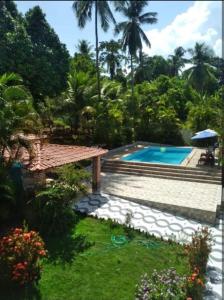 Kolam renang di atau dekat dengan Casa Akira Paradise Suíte
