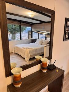 Postel nebo postele na pokoji v ubytování Azotea Suites & Apartments