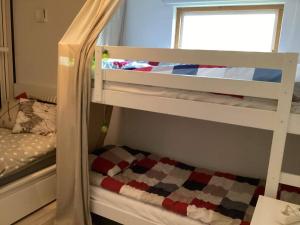 Postel nebo postele na pokoji v ubytování 4 star holiday home in SÖLVESBORG + 21 fotografií