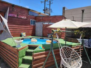 Photo de la galerie de l'établissement hostal playera, à Constitución