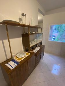 Kuchyň nebo kuchyňský kout v ubytování Casa Joaninha Biasutti