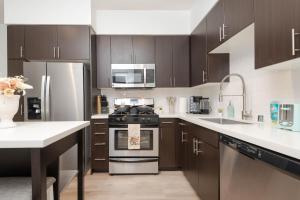 Η κουζίνα ή μικρή κουζίνα στο The Modern Suite Residences