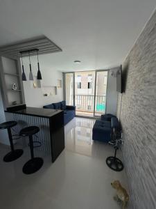 Un televizor și/sau centru de divertisment la HERMOSO APARTAMENTO EN RICAURTE CUDINAMARCa +1 fotografie