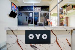 TV a/nebo společenská místnost v ubytování Hotel O Panchi Pride + 23 fotografií