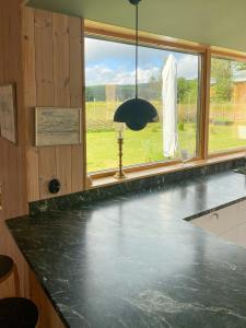 Φωτογραφία από το άλμπουμ του Architect-Designed House Near Orbaden Beach σε Vallsta