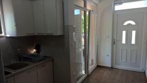 Kuchyňa alebo kuchynka v ubytovaní Villa Palas Apartments 2