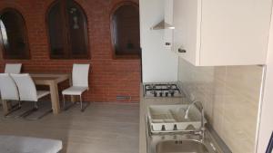 Posedenie v ubytovaní Apartments and room Suza