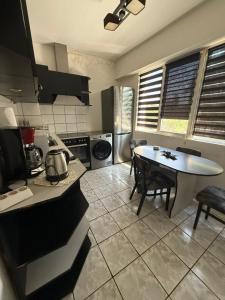 Una cocina o zona de cocina en Апартамент Василеви