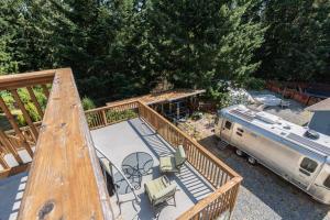 an aerial view of an rv parked on a deck at Pet friendly Family home in Shawnigan Lake in Shawnigan Lake