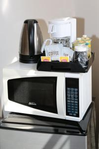 a microwave sitting on top of a table at Nash Hotel in Berkeley