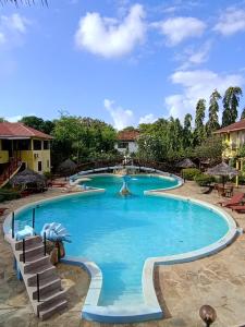 a swimming pool at the resort at Double Heart Resort in Malindi