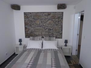 Katil atau katil-katil dalam bilik di Casa do Simão