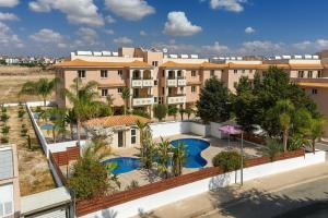 an aerial view of a resort with a swimming pool at Tersefanou Retreat Studio Apt in Tersephanou