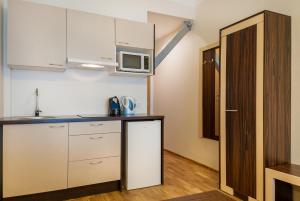 Kuchyň nebo kuchyňský kout v ubytování Pirita Beach Apartments & SPA