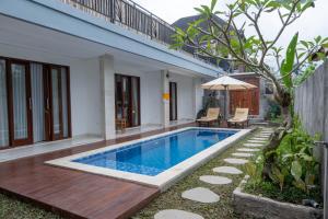 Πισίνα στο ή κοντά στο Graha Dwarkavati Ubud