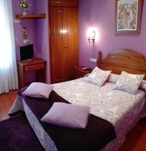 Postel nebo postele na pokoji v ubytování Hostal Mizmaya