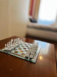 a chess board sitting on top of a table at La Bora Roiana in Trieste