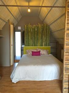 Een bed of bedden in een kamer bij La Jauchelle