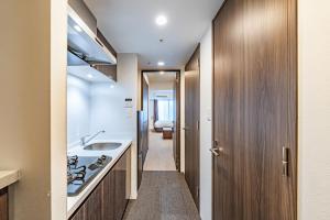 Η κουζίνα ή μικρή κουζίνα στο Apartment Hotel 11 Nagoya Sakae