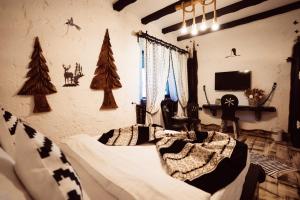 TV a/nebo společenská místnost v ubytování PENSIUNEA Agi Traditional - 4 MARGARETE