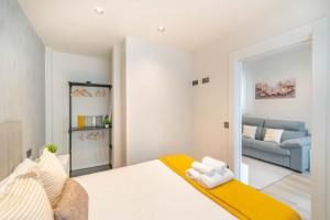 Ένα ή περισσότερα κρεβάτια σε δωμάτιο στο Loft Jorgito F by STS APARTMENTS