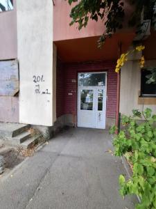 a door to a building with the number at Apartament Fantasy in Craiova