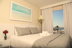 Cama ou camas em um quarto em KS Beach Hotel