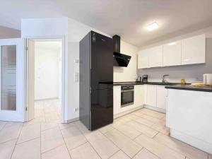 Η κουζίνα ή μικρή κουζίνα στο MAX114 moderne Monteurwohnung