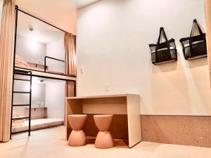 Fotografie z fotogalerie ubytování HOTEL minimumms女性専用カプセルホテルWomen only hotel v destinaci Naha + 117 fotografií