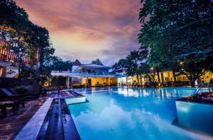 a large swimming pool in front of a building at Mandara Rosen Yala, Kataragama in Kataragama