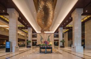 Vstupní hala nebo recepce v ubytování Happiness Hotel