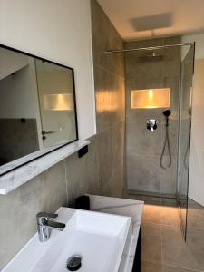 Ένα μπάνιο στο Rednitz Luxus House