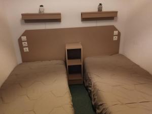 Ένα ή περισσότερα κρεβάτια σε δωμάτιο στο Appartement T2, 20m des Pistes, En Relooking
