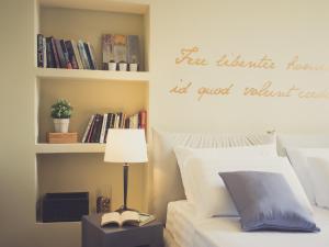 A bed or beds in a room at Domus Corsini