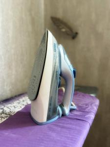 a toaster sitting on top of a purple table at Cozy Apart in Center in Baku +25 photos