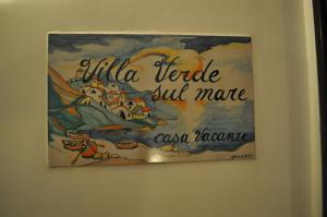a painting of a pirate ship on a wall at villa verde sul mare in Vietri sul Mare