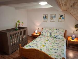 a bedroom with a bed and two night stands at Ferienhaus Max Schmeling in Benneckenstein +20 photos