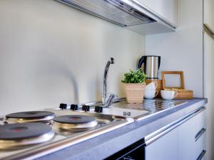 A kitchen or kitchenette at Domus Corsini
