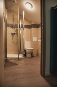 Ένα μπάνιο στο Le Combo Calme confort et flexibilité près des thermes