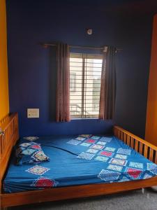 Ένα ή περισσότερα κρεβάτια σε δωμάτιο στο love moon home stay