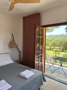Ένα ή περισσότερα κρεβάτια σε δωμάτιο στο Beach Villa Pasithea