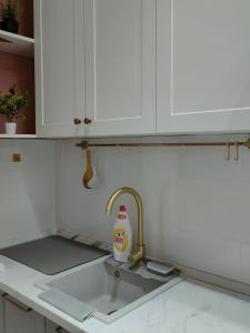 Dapur atau dapur kecil di Уютные апартаменты в центре