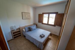 Postel nebo postele na pokoji v ubytování Can Rusiniol 2 + 10 fotografií