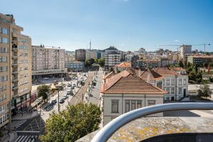 a view of a city with buildings and a street at GuestReady – Urban comfort in Vila Nova de Gaia in Vila Nova de Gaia