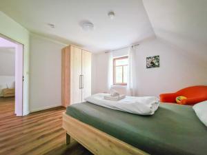 Ένα ή περισσότερα κρεβάτια σε δωμάτιο στο Leybucht