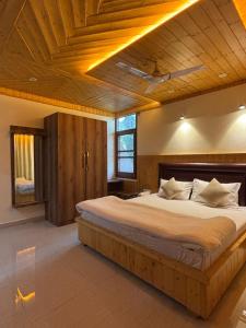 Una cama o camas en una habitación de Mainak Guest House