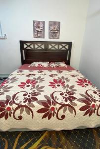 Ένα ή περισσότερα κρεβάτια σε δωμάτιο στο Aisy Homestay 2