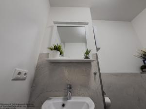 O baie la FeWo Grüne Auszeit - Wilhelmshaven +33 fotografii