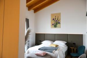 Postel nebo postele na pokoji v ubytování Tenuta Tommasi - Relais Bacco